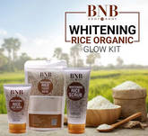 BNB Whitening Rice Organic Glow Kit with rice products and a scenic background