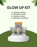 Skincare product set with 'Glow Up Kit' on a white background