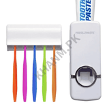 Colorful toothbrushes with a white press-to-paste dispenser on a white background