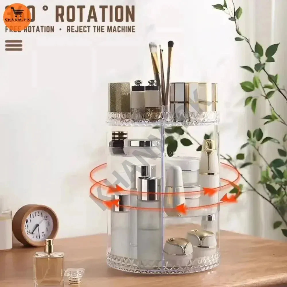 Rotating cylindrical organizer with cosmetic items on a wooden surface with a plant in the background.