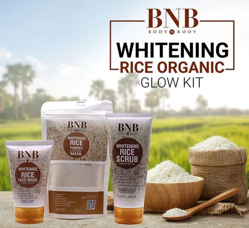 BNB Whitening Rice Organic Glow Kit with rice products and a scenic background
