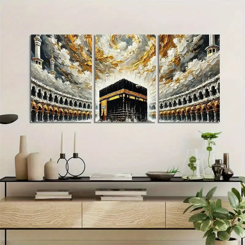 Three-panel wall art of a religious building with gold and black details, displayed above a wooden cabinet.
